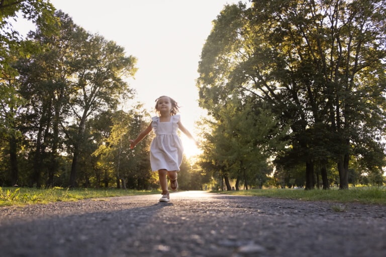 full-shot-little-girl-running-outdoors